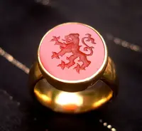 ../images/rings/Chuck-Nash-gold-ring-with-lion.webp